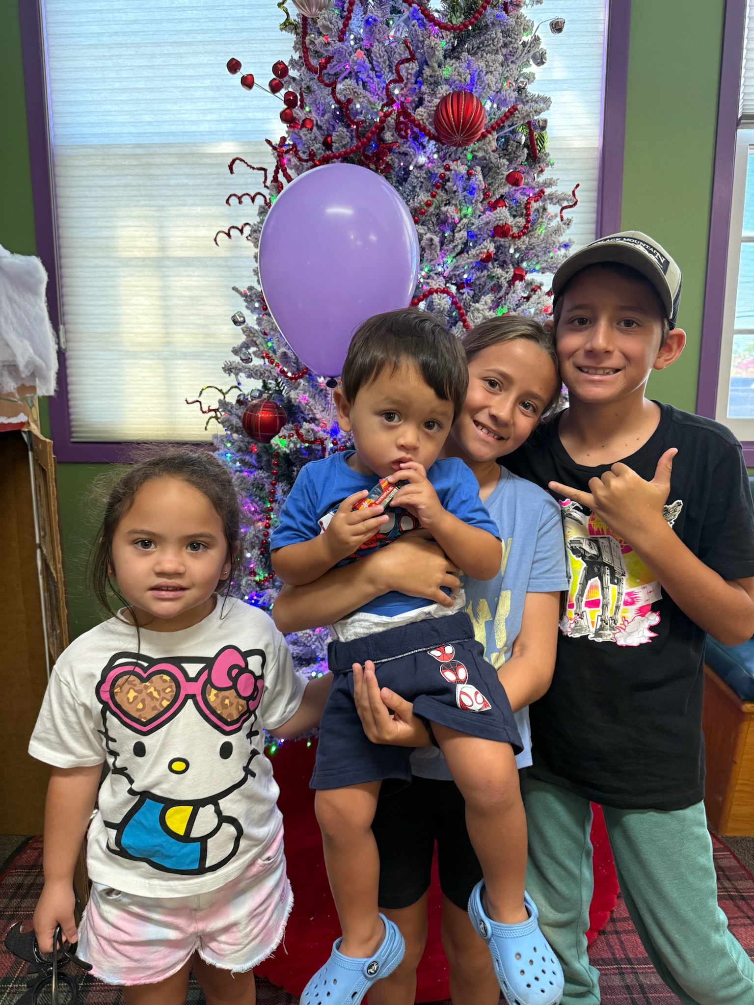Family smiling together at Kona Kids Dentist