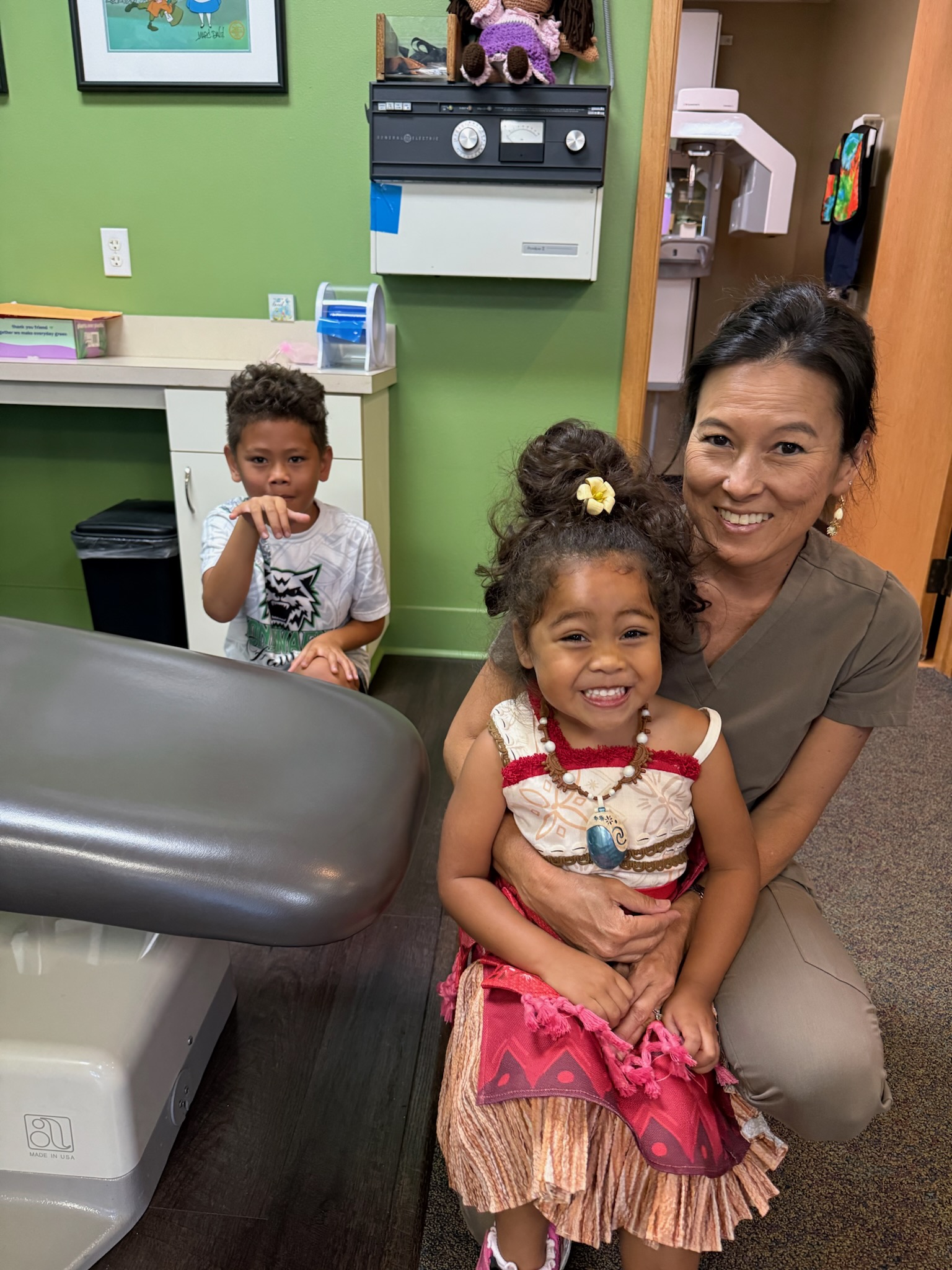 Children sharing a family moment at Kona Kids Dentist