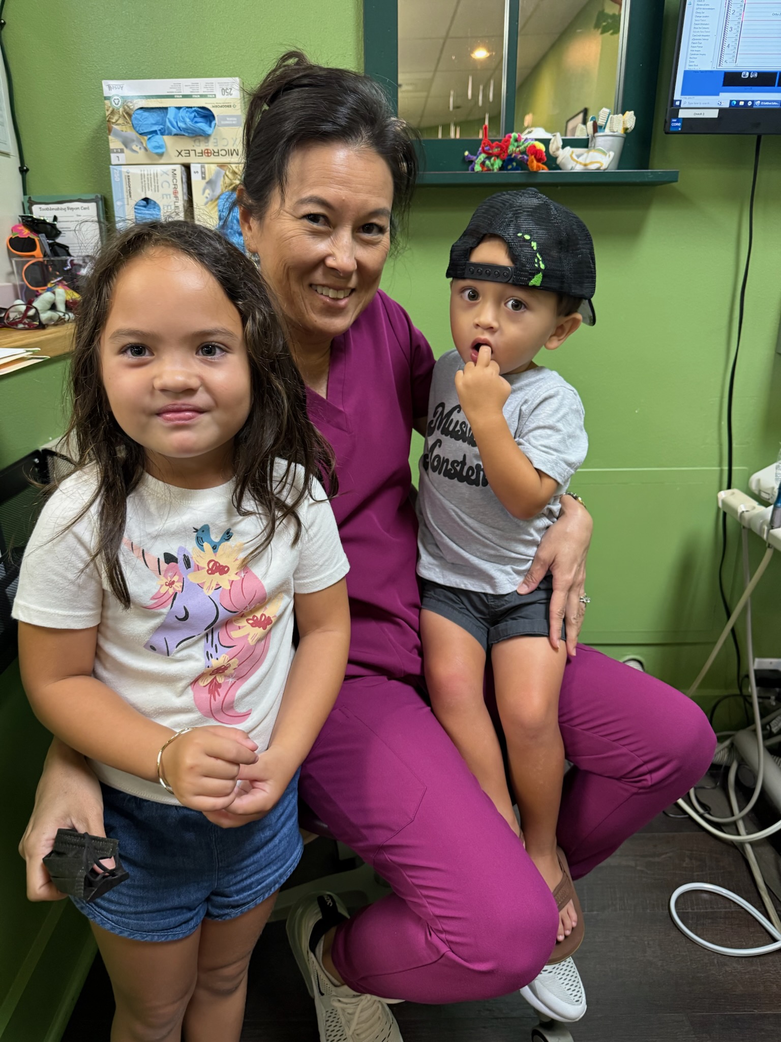 Children sharing a family moment at Kona Kids Dentist